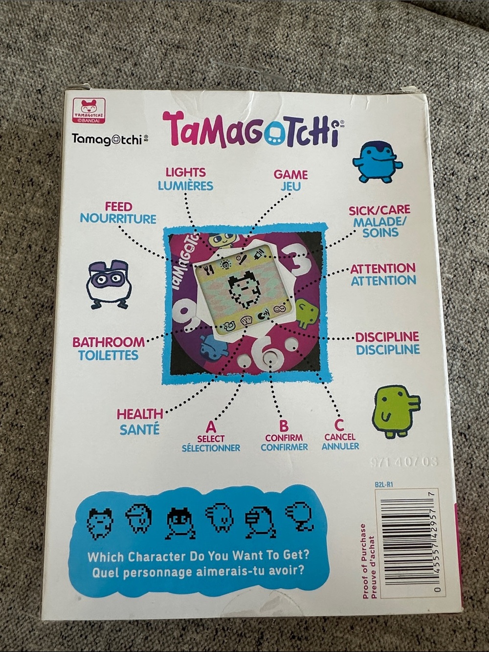 Tamagotchi Gen1 Virtual Pet Keychain - White with Multicolor Spots - Picture 2 of 3